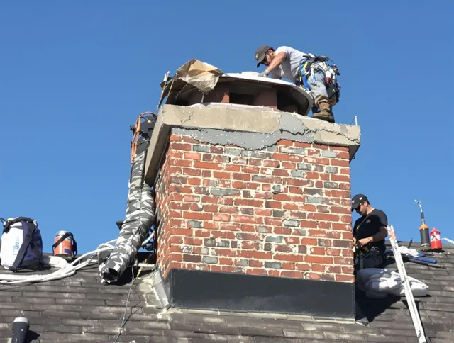 Hilliard Chimney Sweep installing a custom chimney crown in Hilliard, OH