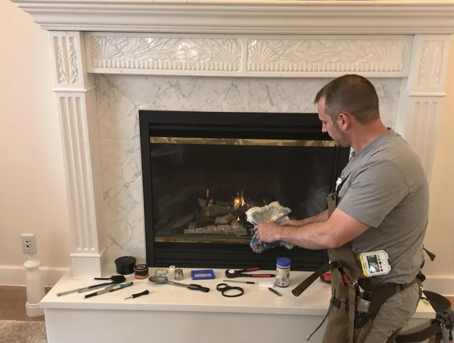 Hilliard Chimney Sweep performing fireplace maintenance in Hilliard, OH
